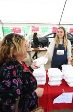 ELIZABETH OLSEN at Hope for the Holidays Celebrity Volunteer Event in Los Angeles 12/10/2016