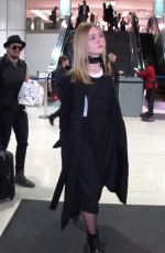 ELLE FANNING at LAX AIrport in Los Angeles 12/15/2016