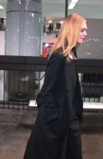 ELLE FANNING at LAX AIrport in Los Angeles 12/15/2016