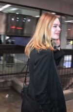 ELLE FANNING at LAX AIrport in Los Angeles 12/15/2016