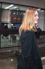 ELLE FANNING at LAX AIrport in Los Angeles 12/15/2016
