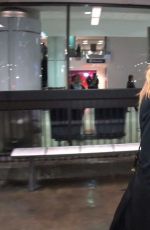 ELLE FANNING at LAX AIrport in Los Angeles 12/15/2016