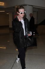 ELLE FANNING at Los Angeles International Airport 12/08/2016