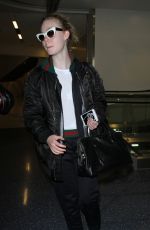ELLE FANNING at Los Angeles International Airport 12/08/2016