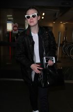 ELLE FANNING at Los Angeles International Airport 12/08/2016