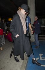 EMMA STONE Leaves Heathrow Airport in London 12/13/2016