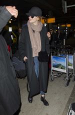 EMMA STONE Leaves Heathrow Airport in London 12/13/2016