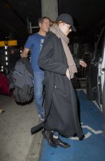 EMMA STONE Leaves Heathrow Airport in London 12/13/2016