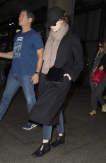 EMMA STONE Leaves Heathrow Airport in London 12/13/2016