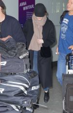 EMMA STONE Leaves Heathrow Airport in London 12/13/2016
