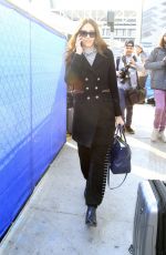 EMMY ROSSUM at LAX Airport in Los Angeles 12/07/2016