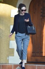 EMMY ROSSUM Leaves a Friend