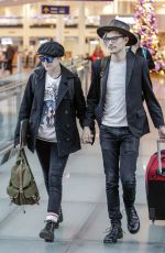 EVAN RACHEL WOOD with Her Boyfriend at Airport in Montreal 12/15/2016
