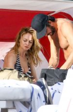 HEATHER GRAHAM in Bikini Top at a Beach in Miami 12/30/2016