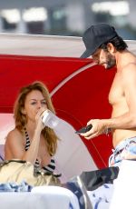 HEATHER GRAHAM in Bikini Top at a Beach in Miami 12/30/2016