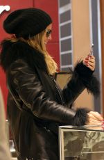 HEIDI KLUM Shopping in Aspen 12/22/2016
