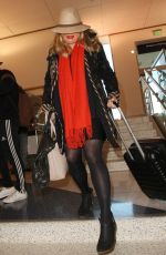 JENNIFER COOLIDGE at LAX Airport in Los Angeles 12/20/2016