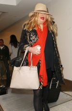 JENNIFER COOLIDGE at LAX Airport in Los Angeles 12/20/2016