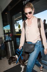 KATE UPTON at LAX Airport in Los Angeles 12/29/2016