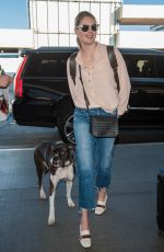 KATE UPTON at LAX Airport in Los Angeles 12/29/2016