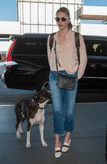KATE UPTON at LAX Airport in Los Angeles 12/29/2016