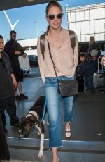 KATE UPTON at LAX Airport in Los Angeles 12/29/2016