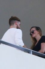 KATIE CASSIDY Kisses Her Boyfriend on the Balcony of Her Hotel in Miami 12/14/2016