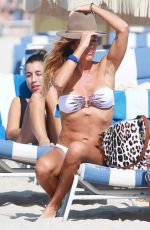 KELLY BENSIMON in Bikini on the Beach in Miami 12/04/2016