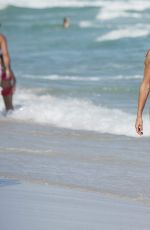 KELLY BENSIMON in Bikini on the Beach in Miami 12/25/2016