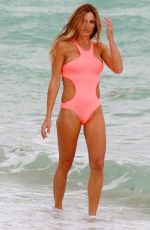 KELLY BENSIMON in Swimsuit on the Beach in Miami 12/03/2016
