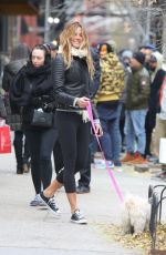 KELLY BENSIMON Walks Her Dog Out in New York 12/10/2016