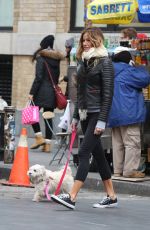 KELLY BENSIMON Walks Her Dog Out in New York 12/10/2016