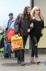 KESHA and Her Boyfriend Brad Ashenfelter at LAX Airport 12/21/2016
