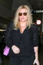 KESHA and Her Boyfriend Brad Ashenfelter at LAX Airport 12/21/2016
