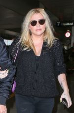 KESHA and Her Boyfriend Brad Ashenfelter at LAX Airport 12/21/2016