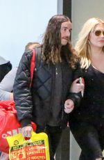 KESHA and Her Boyfriend Brad Ashenfelter at LAX Airport 12/21/2016