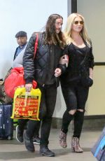 KESHA and Her Boyfriend Brad Ashenfelter at LAX Airport 12/21/2016
