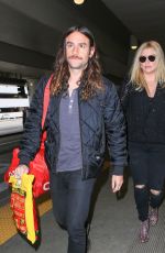 KESHA and Her Boyfriend Brad Ashenfelter at LAX Airport 12/21/2016