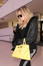 KHLOE KARDASHIAN at Los Angeles International Airport 12/07/2016