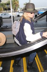 KIM BASINGER at LAX Airport in Los Angeles 12/05/2016
