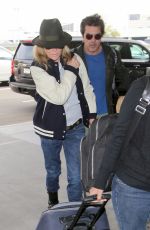 KIM BASINGER at LAX Airport in Los Angeles 12/05/2016