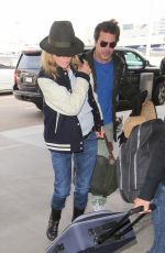 KIM BASINGER at LAX Airport in Los Angeles 12/05/2016