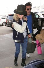 KIM BASINGER at LAX Airport in Los Angeles 12/05/2016