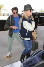 KIM BASINGER at LAX Airport in Los Angeles 12/05/2016