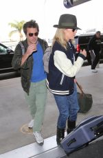 KIM BASINGER at LAX Airport in Los Angeles 12/05/2016