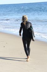 LADY VICTORIA HERVEY in Wetsuit on the Beach in Malibu 12/18/2016