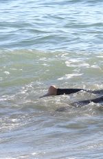 LADY VICTORIA HERVEY in Wetsuit on the Beach in Malibu 12/18/2016