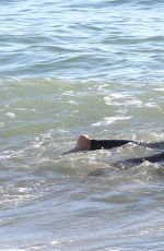 LADY VICTORIA HERVEY in Wetsuit on the Beach in Malibu 12/18/2016