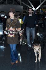 MAGGIE Q at JFK Airport in New York 12/28/2016