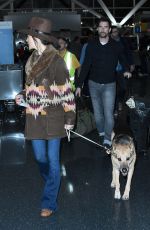MAGGIE Q at JFK Airport in New York 12/28/2016